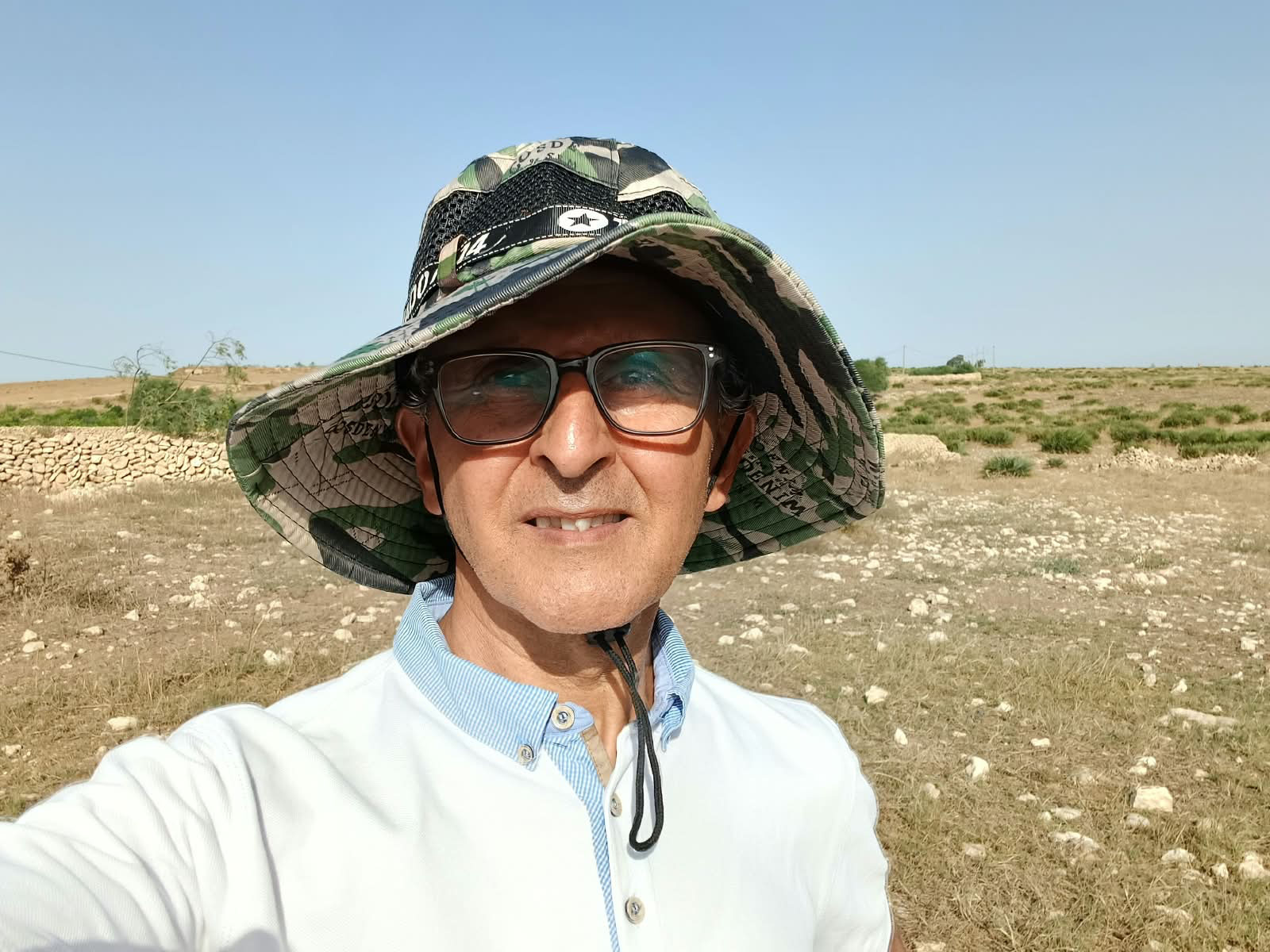 Abdelhamid Badaoui in the dry landscape of the Doukkala region in Morocco.